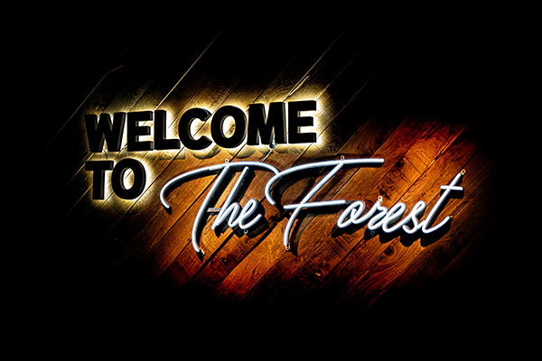 "Welcome to the Forest" Schriftzug